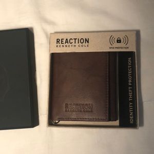 Brown leather wallet by Reaction Kenneth Cole